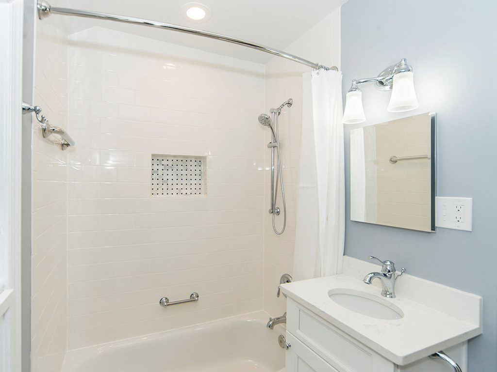 Bathroom project in Hyattsville MD with vanity, and a tub shower combination