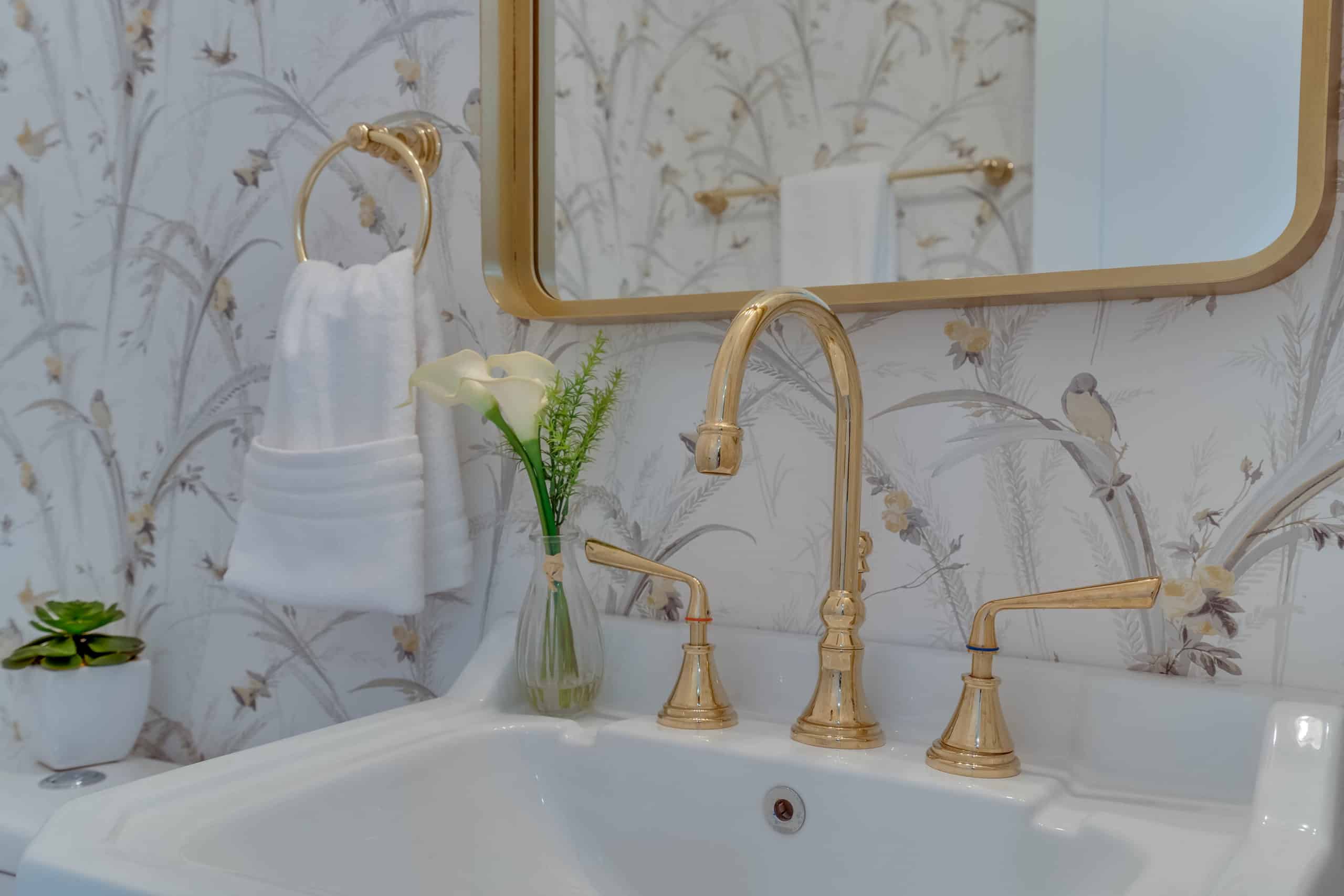 Sink with gold faucets