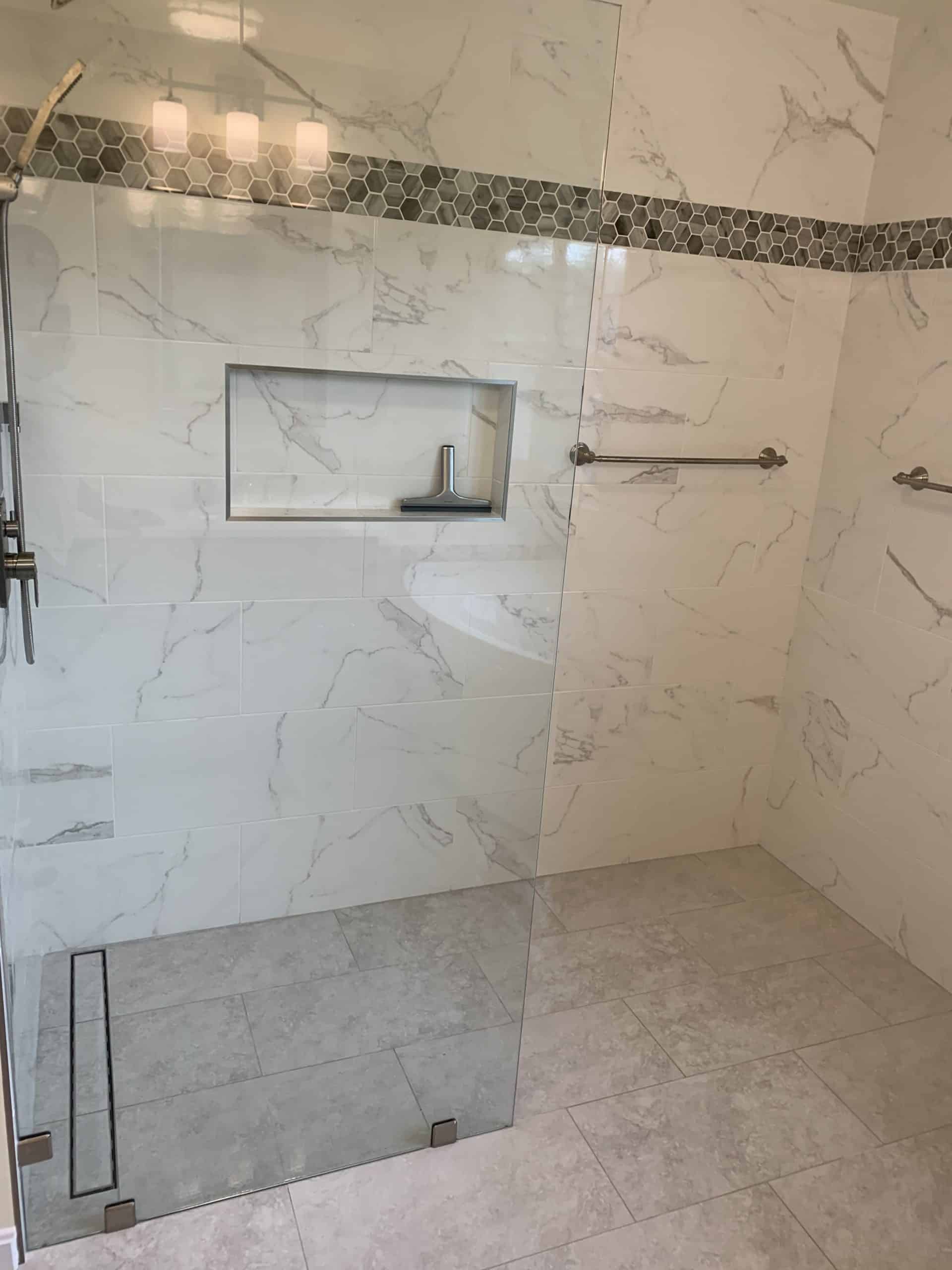 Elegant bathroom with curbless walk-in shower