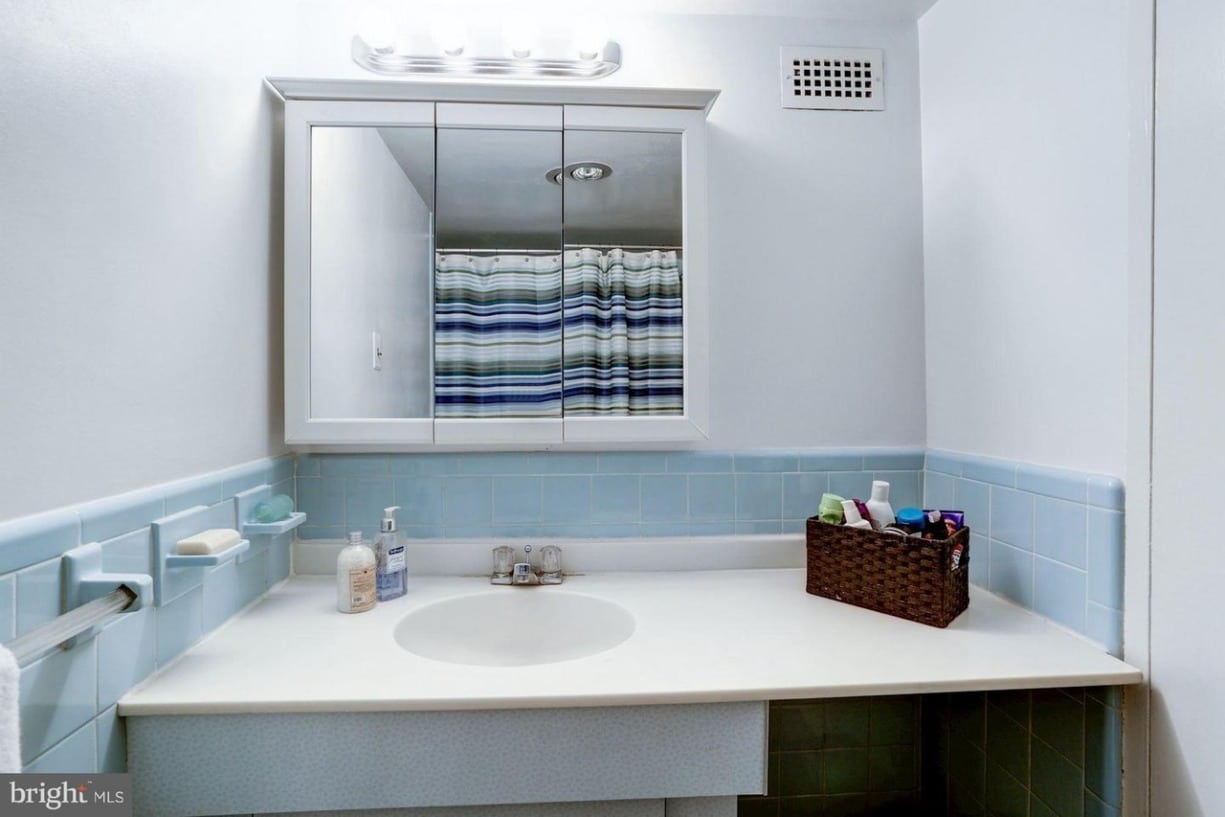 White bathroom with simple vanity style