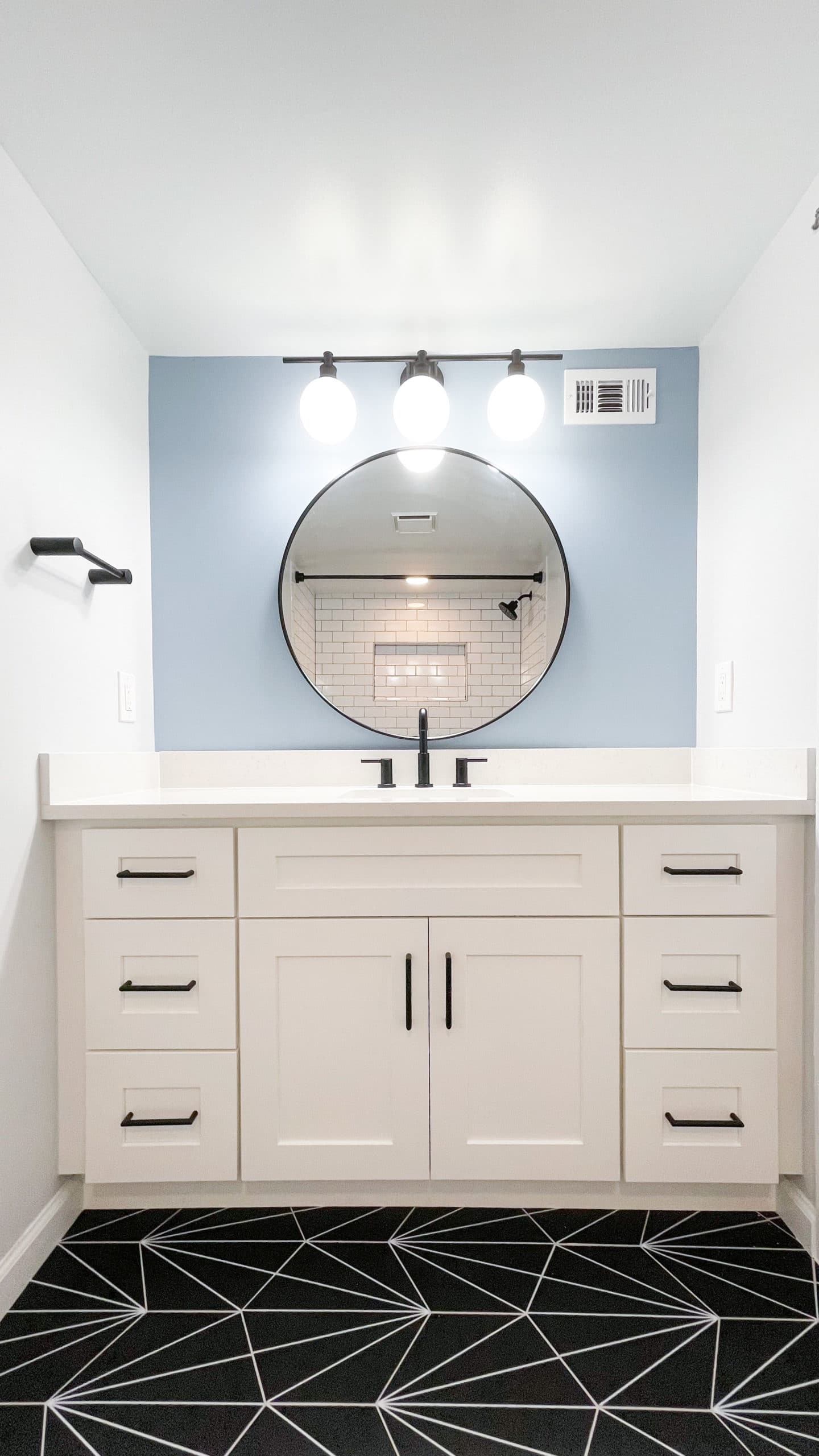 White bathroom with shaker vanity style