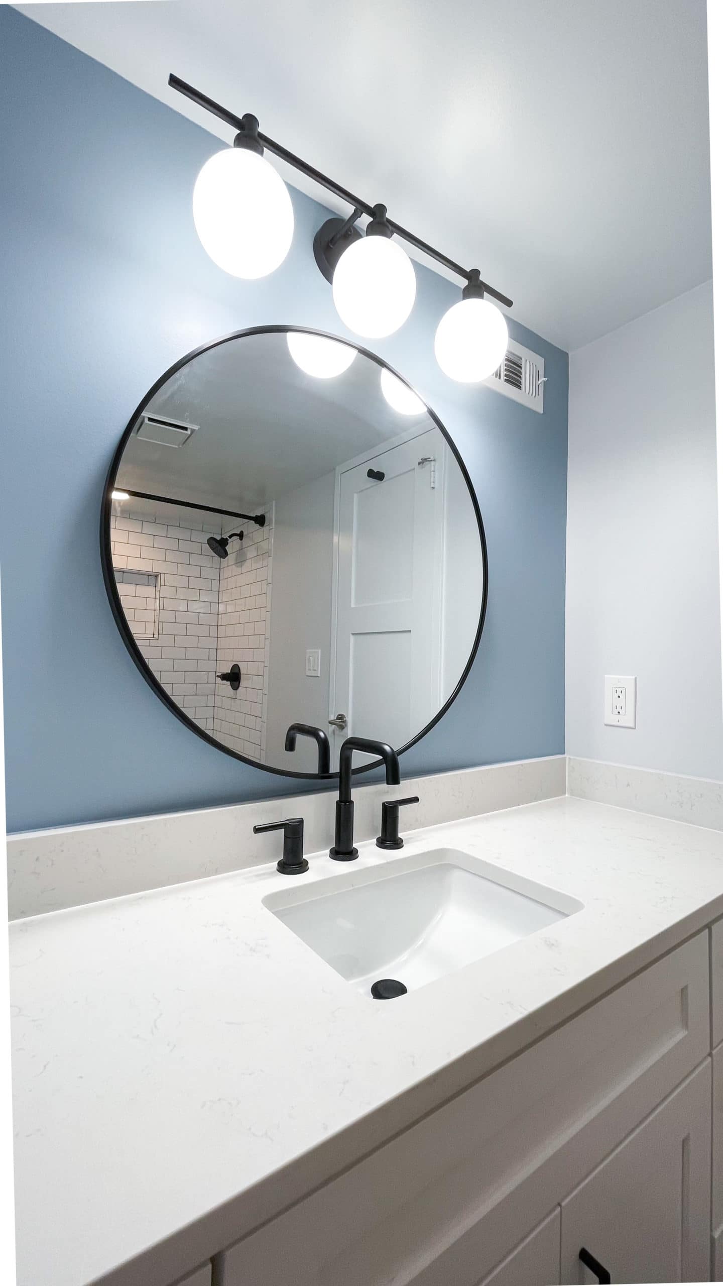 White bathroom with shaker vanity style