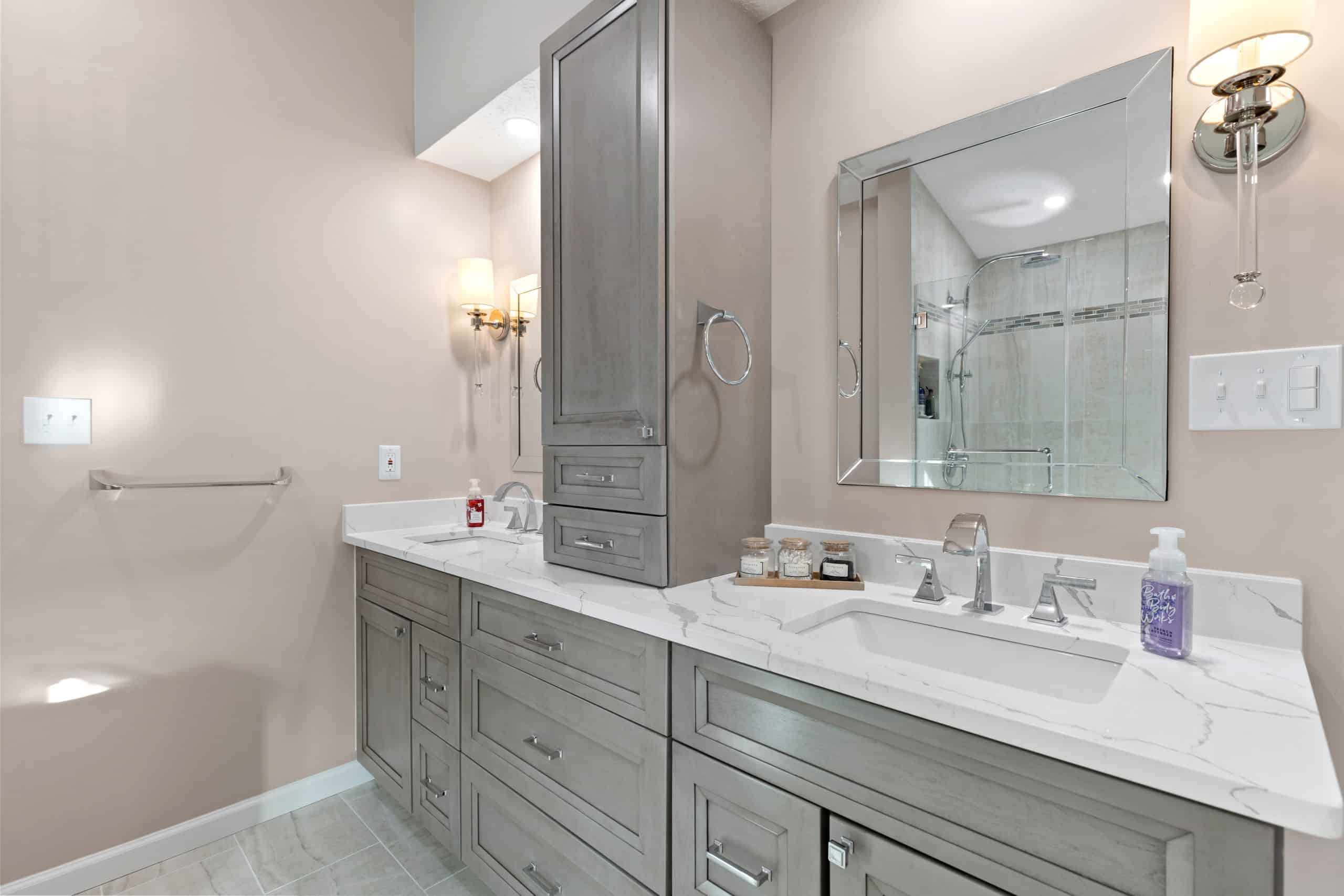 Light pink bathroom with grey vanity