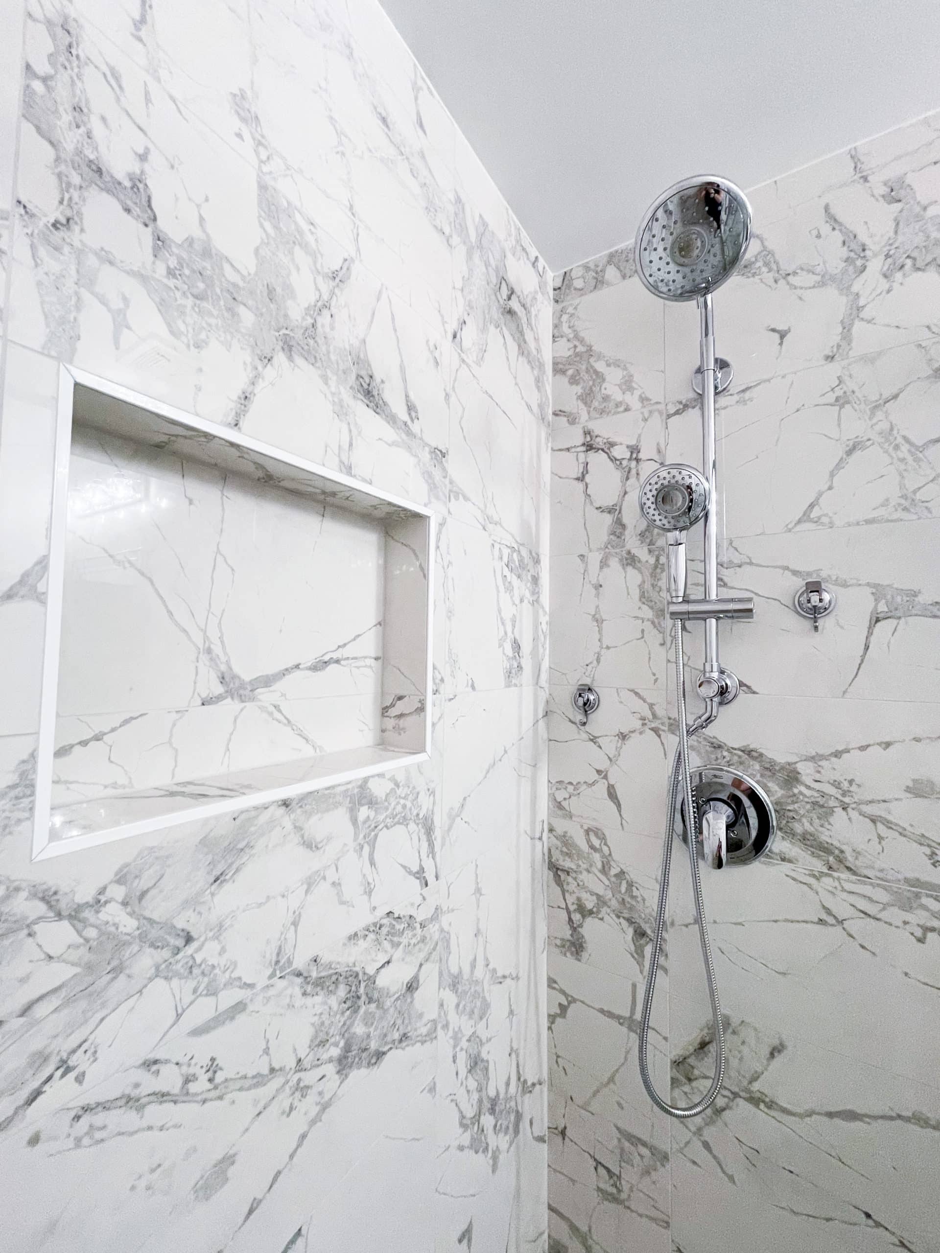 White bathroom style with marble surround shower