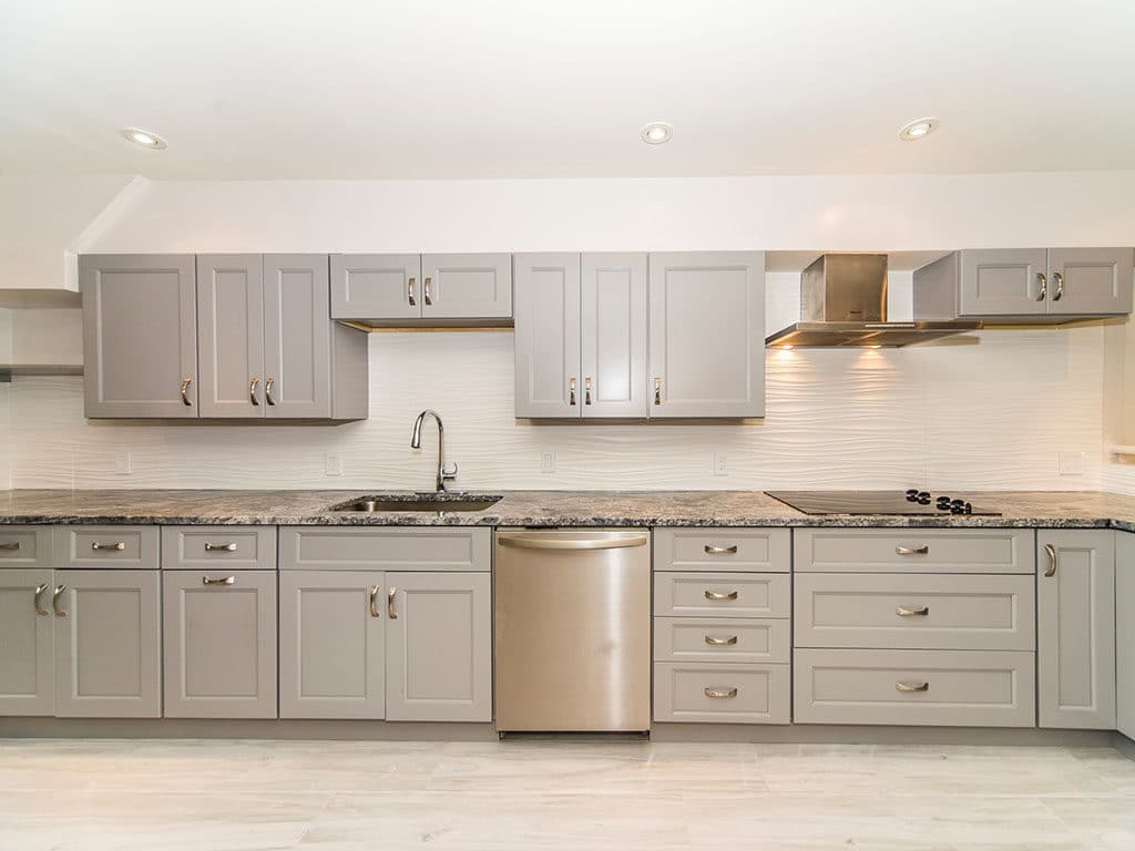 Spacious kitchen with grey shaker cabinets
