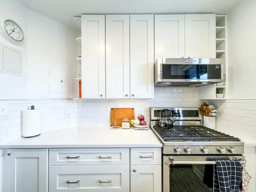 Small kitchen with white shaker cabinets