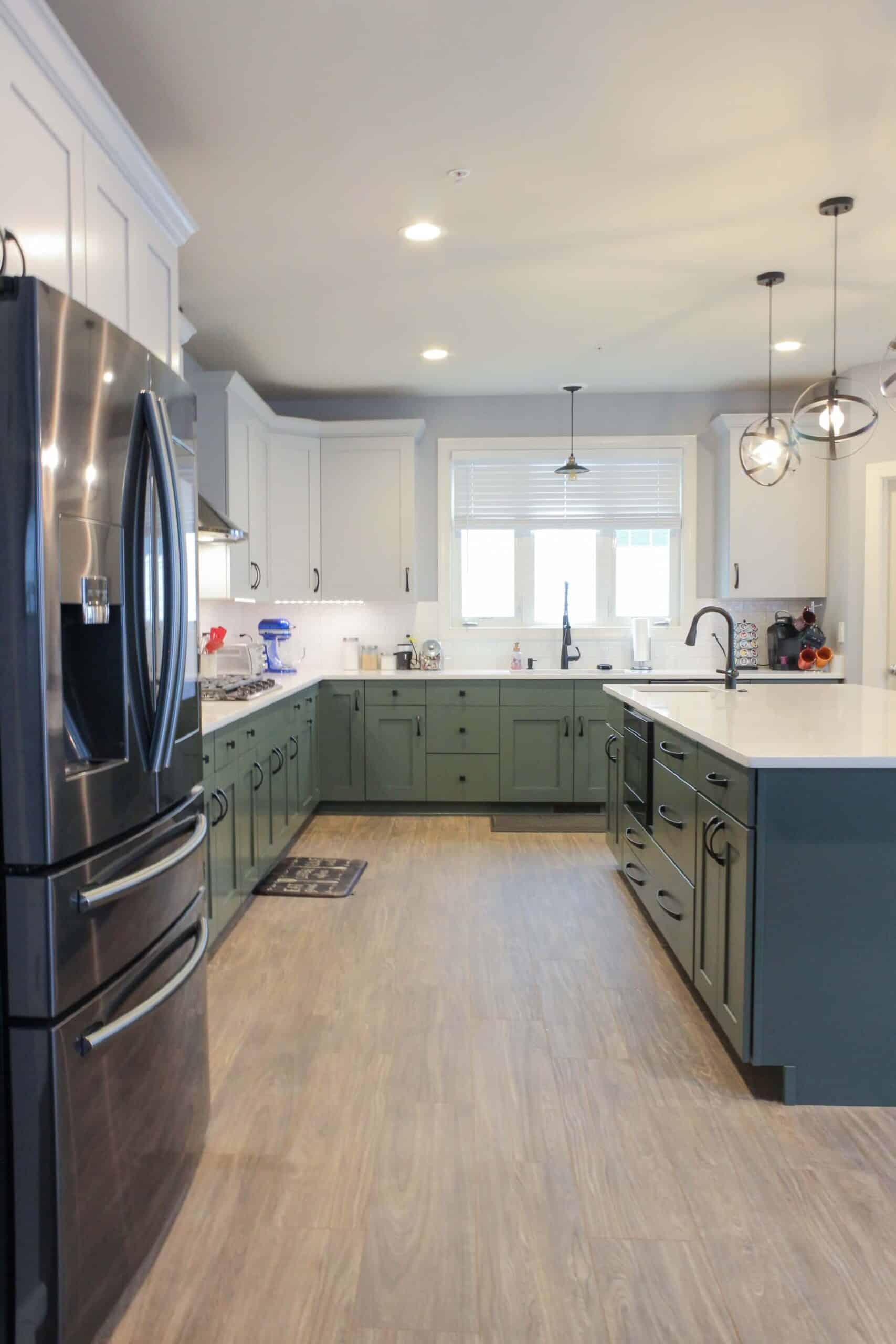 White and Green kitchen style with shaker cabinets