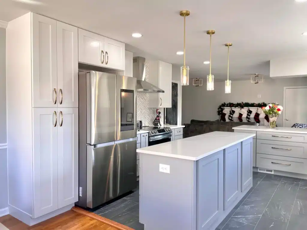 Elegant kitchen project with White and light grey shaker cabinets