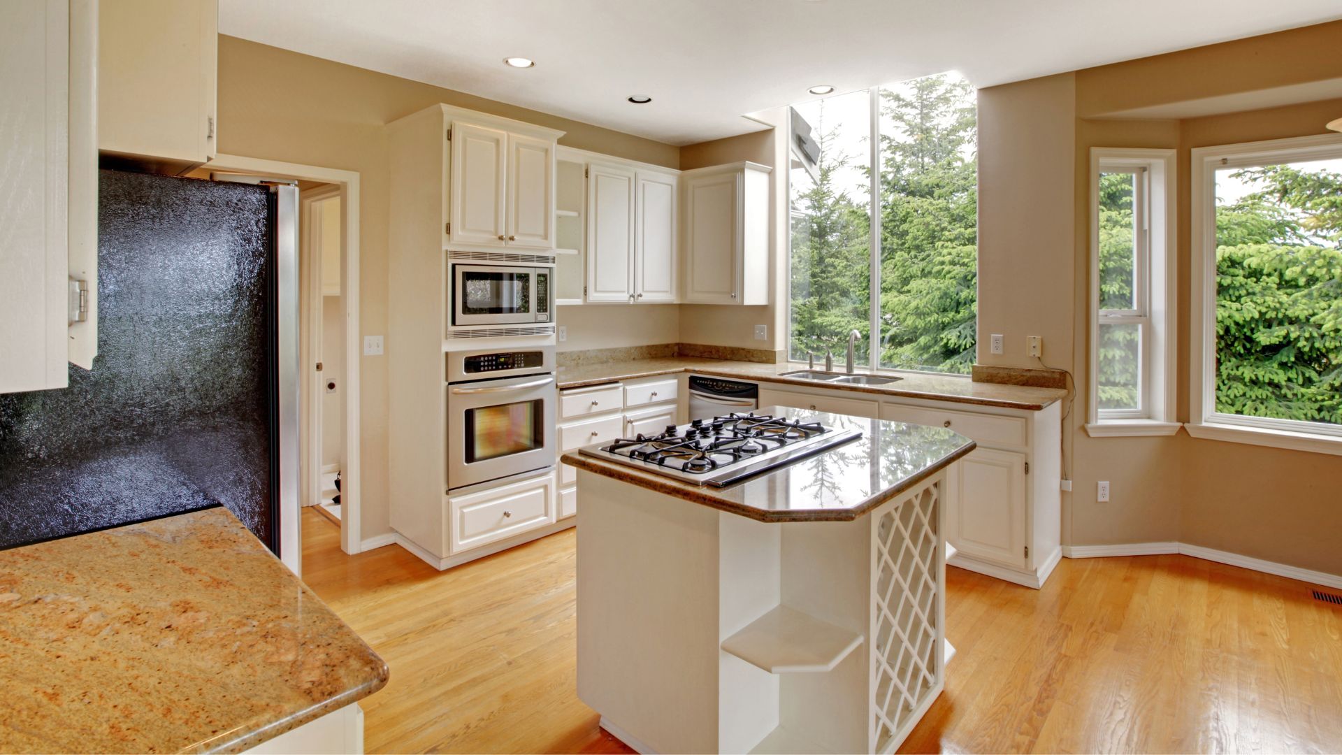 Beadboard-Cabinets-in-a-White-and-Wood-Kitchen.jpg