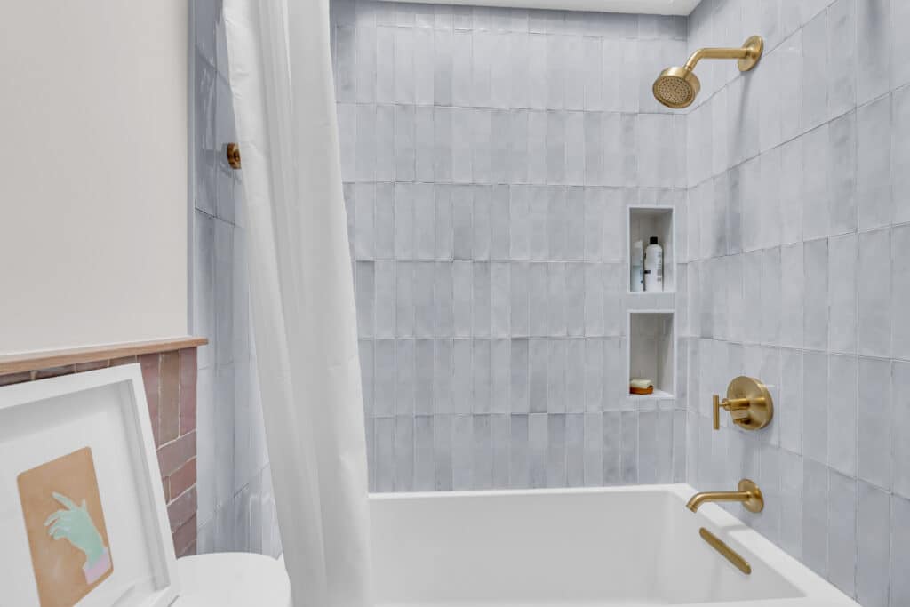 White bathroom with light grey shower tub combination