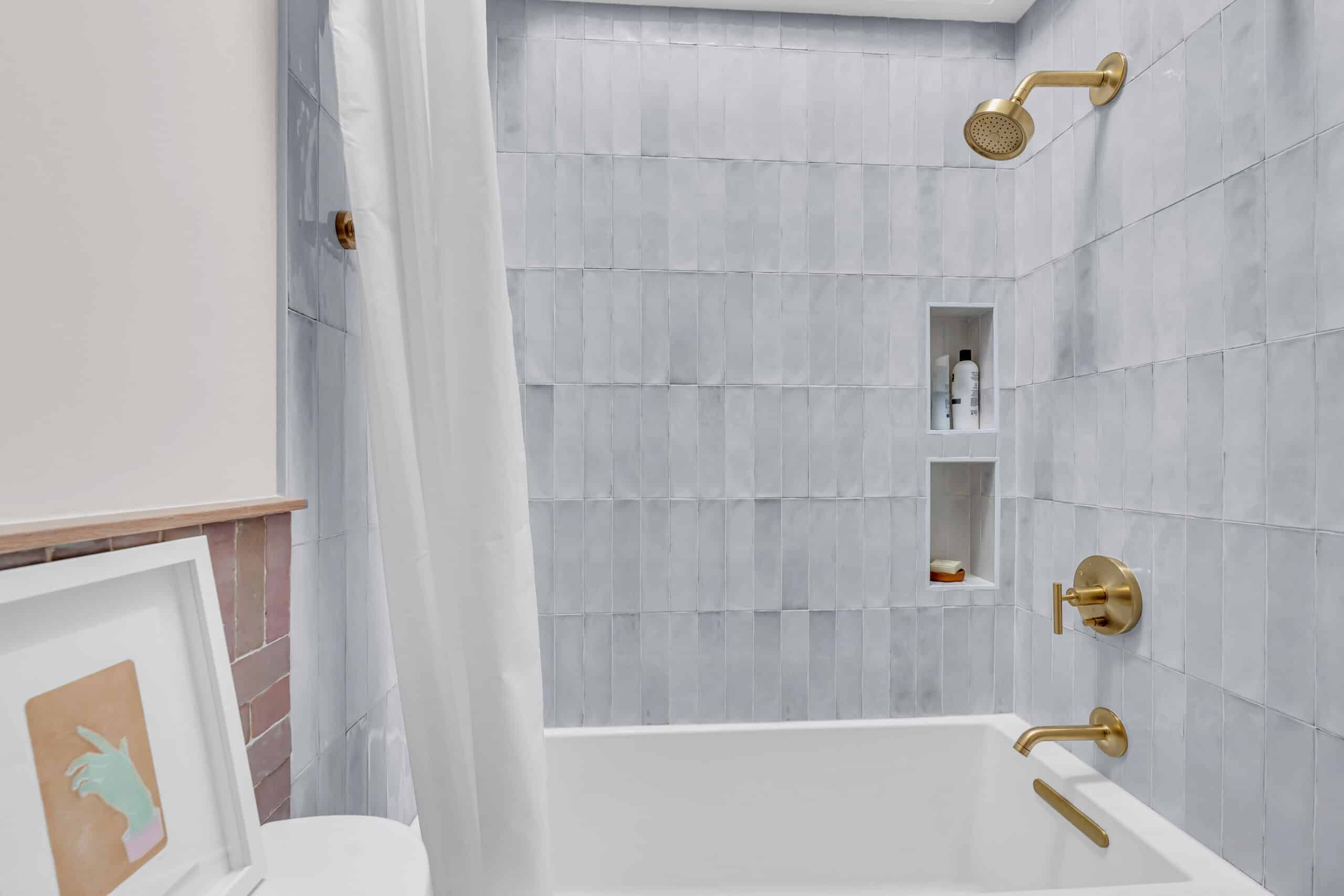 White bathroom with light grey shower tub combination