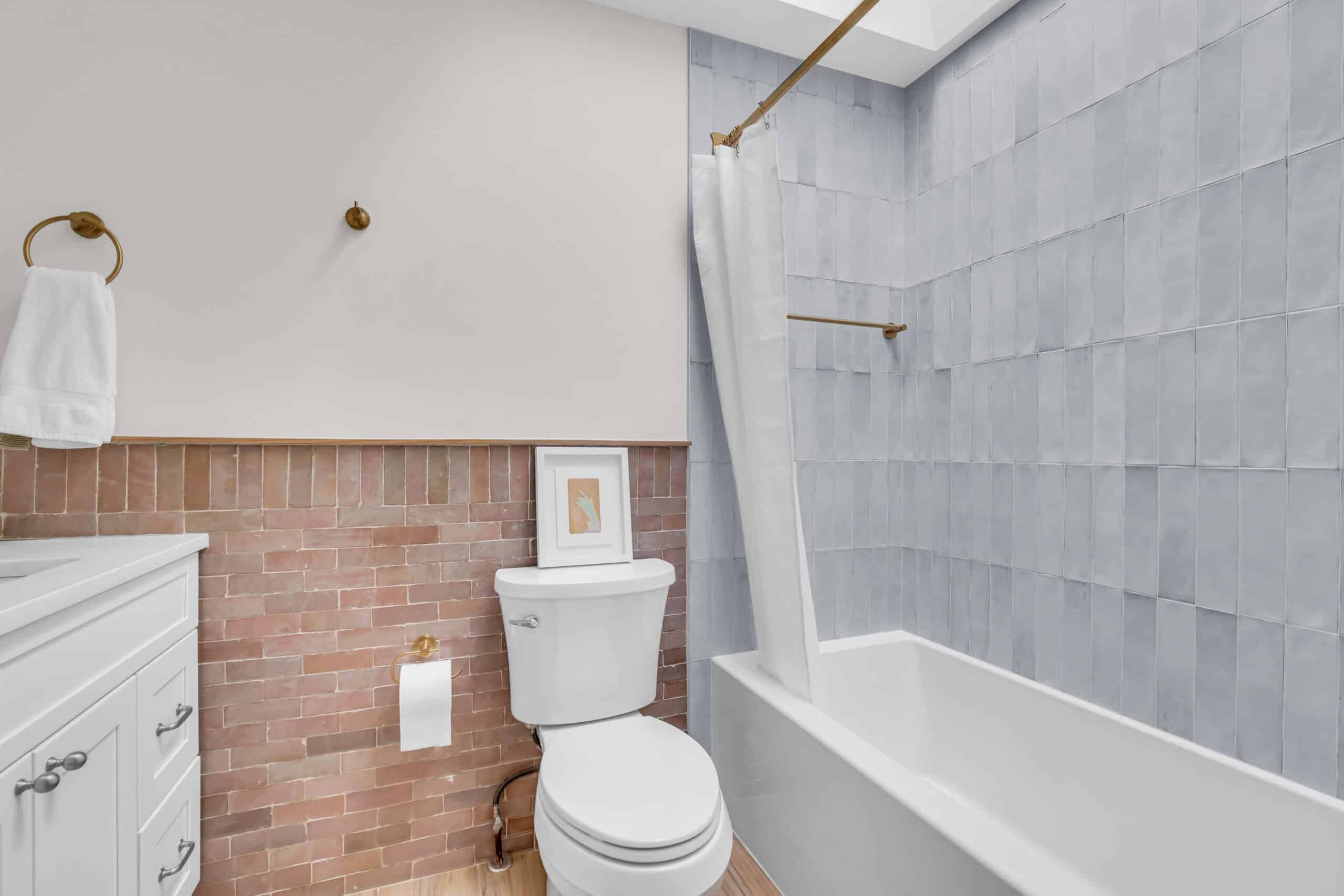 DC White bathroom with light grey shower tub combination