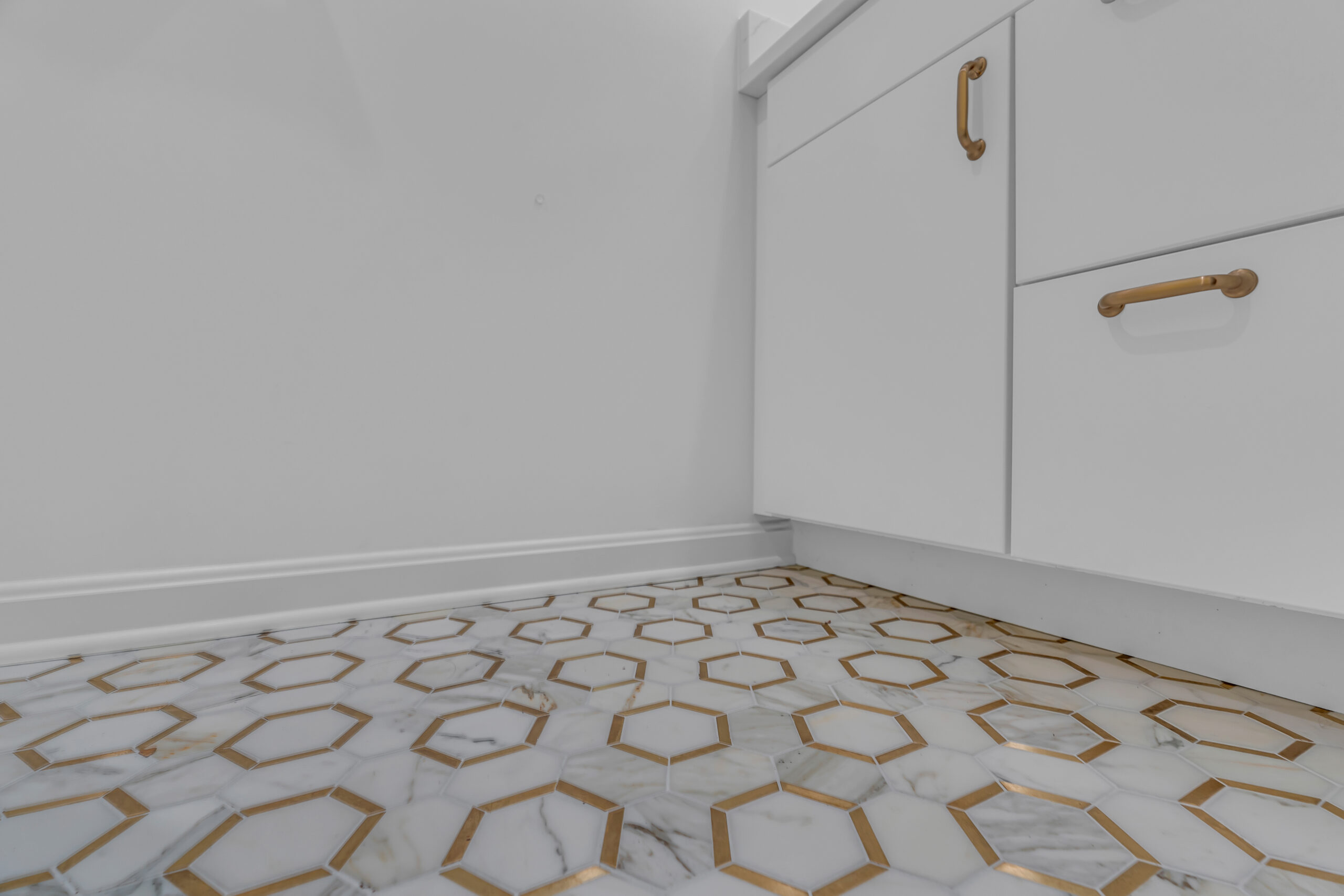 White vanity and tiles flooring