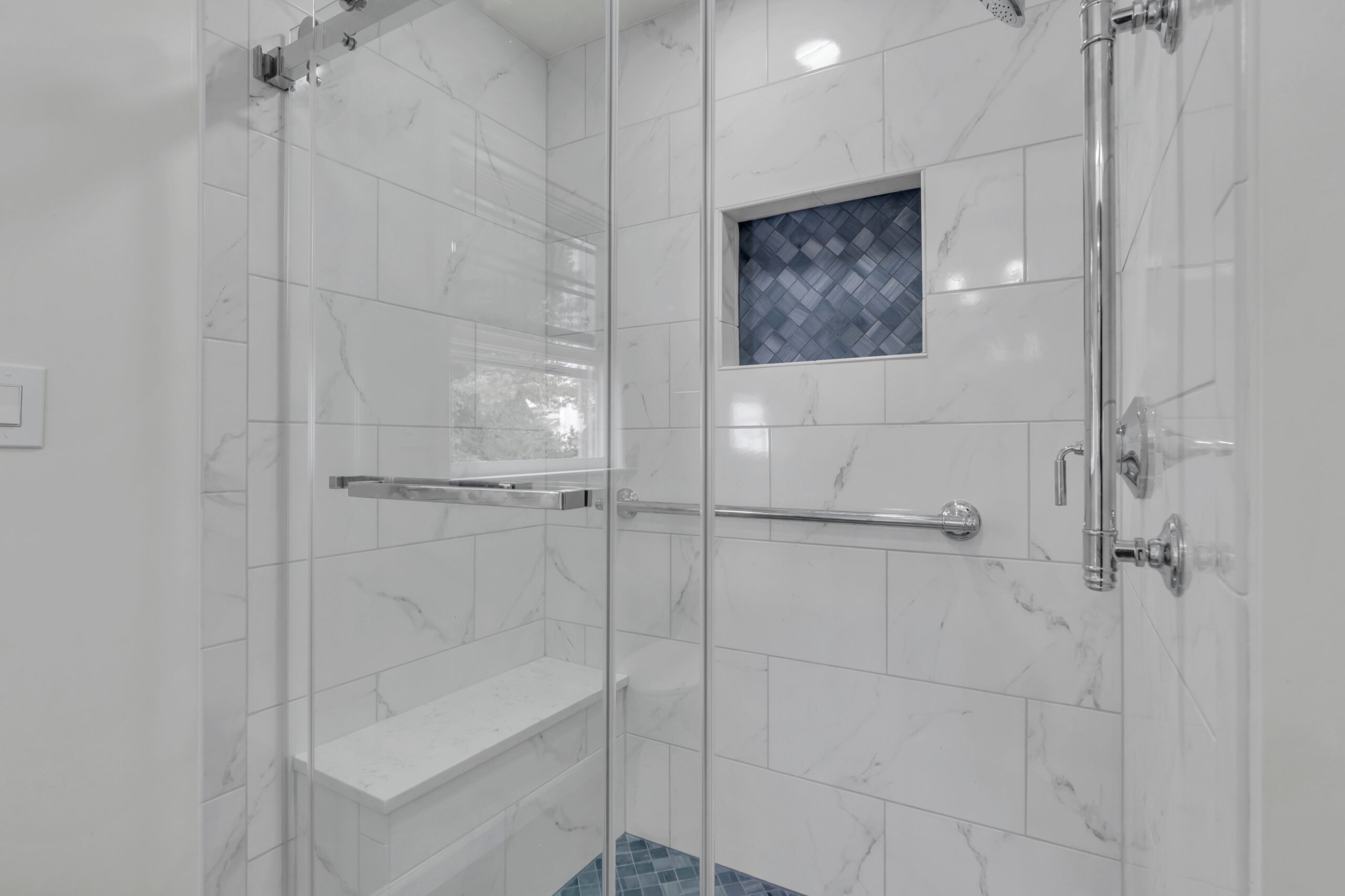 White bathroom with elegant walk-in shower