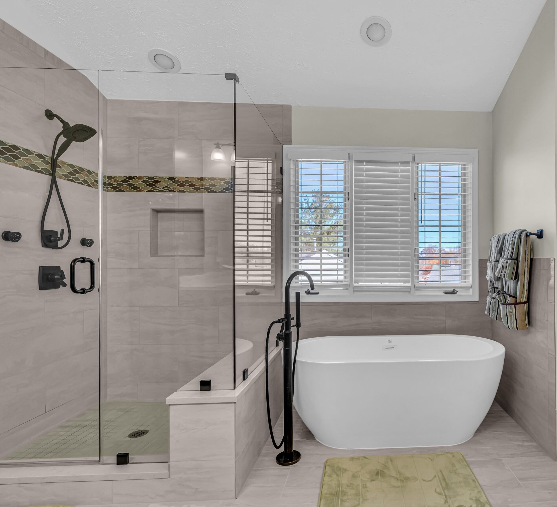 Modern style bathroom with shower and bath tub