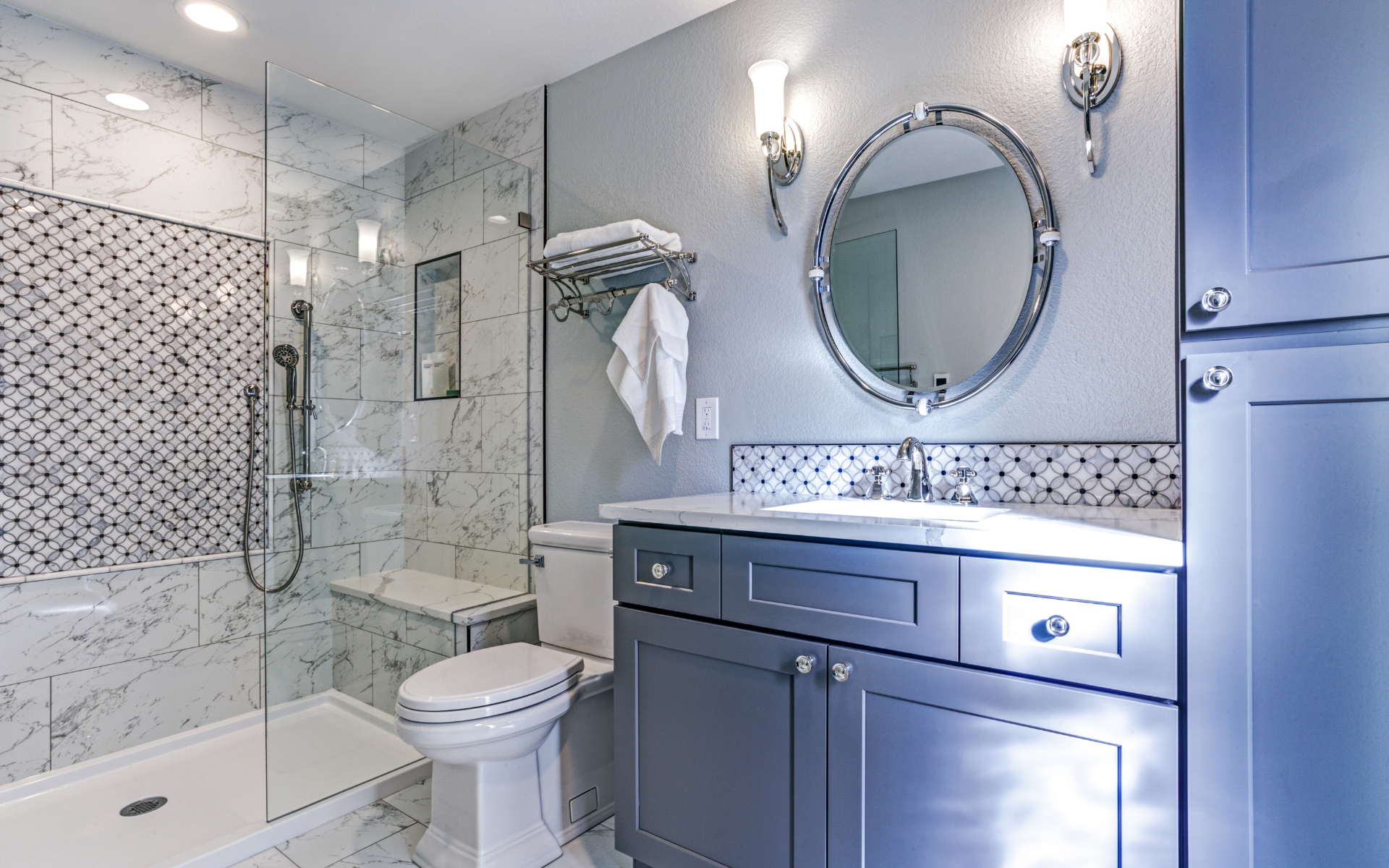 Elegant bathroom with navy blue vanity