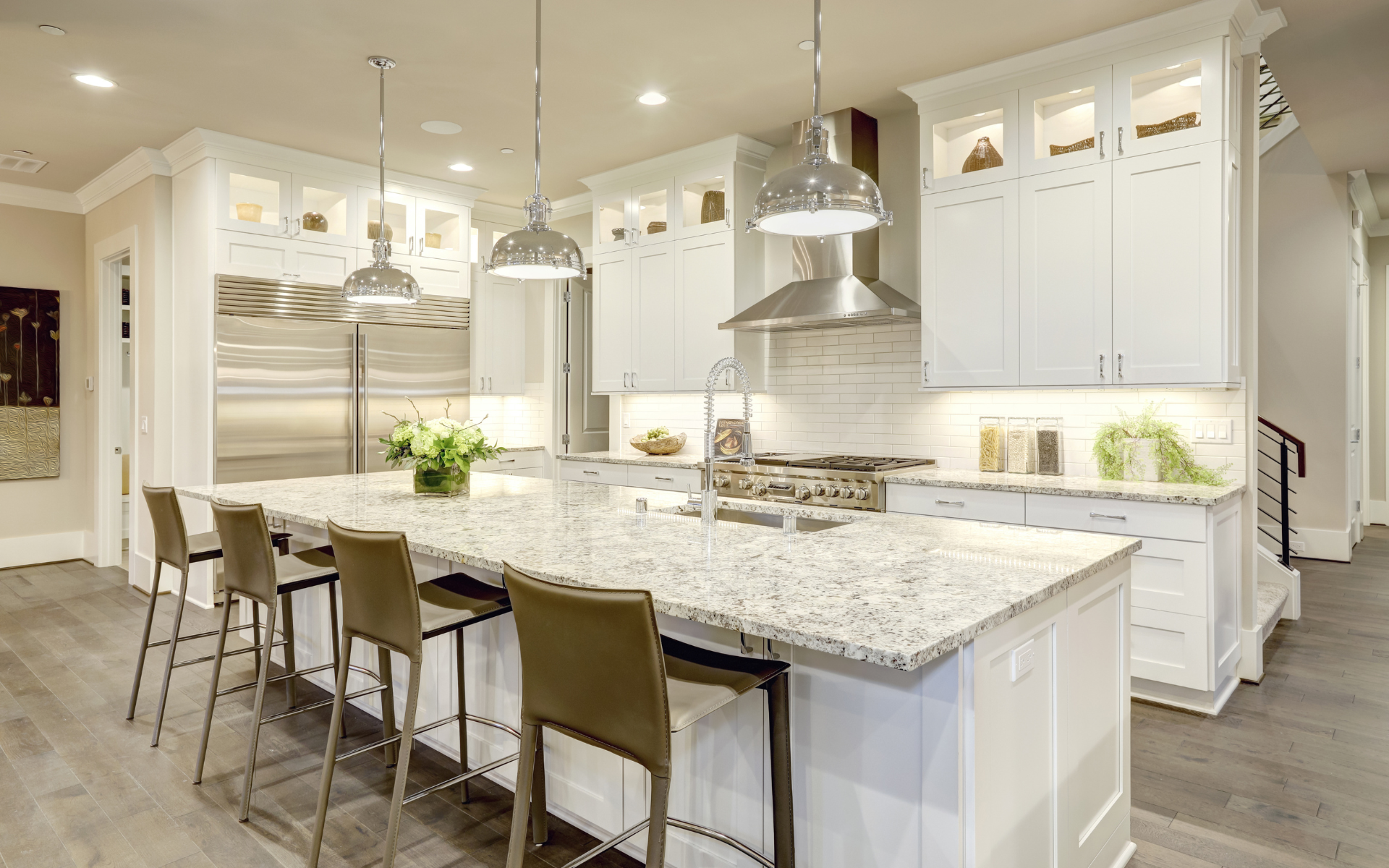 Elegant white kitchen with cabinet lightings
